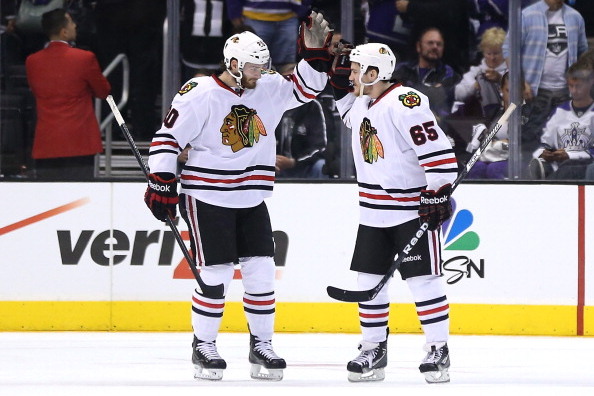 getty_saadbrandonshawandrew2013