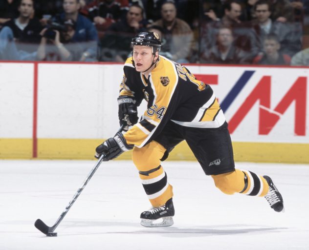 Jarno Kultanen skates with the puck